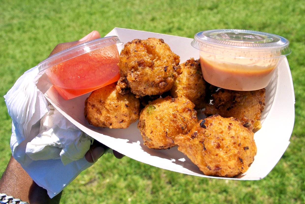 Bahamian cuisine includes these delicious conch fritters with special sauce.