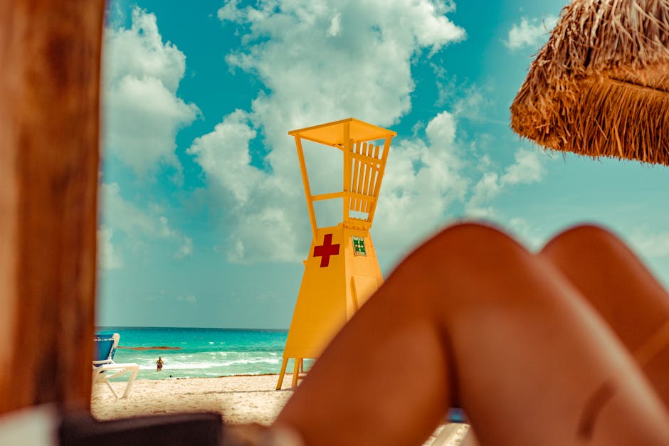 Capture the essence of Cancún with this colorful beach scene featuring a lifeguard tower and idyllic views.